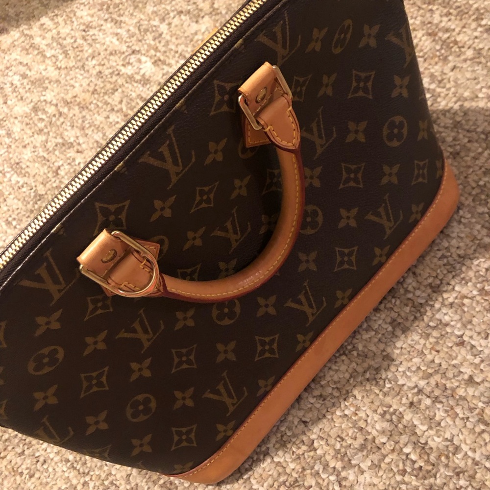Louis Vuitton Alma Monogram Handbag